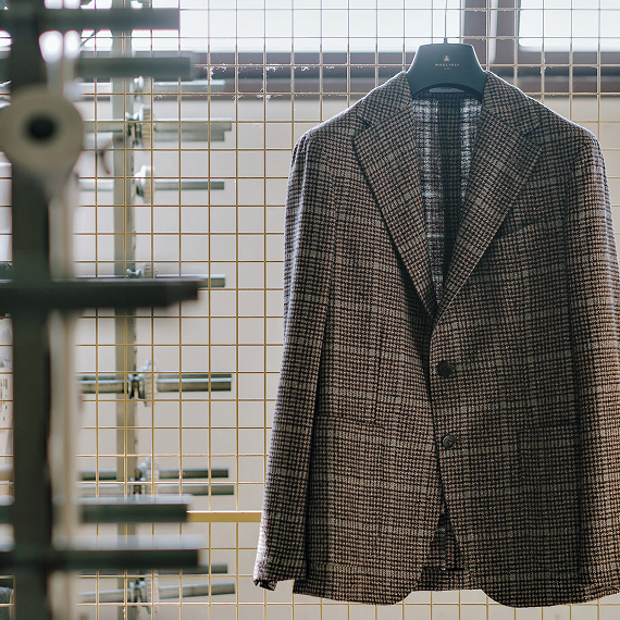 Checked jacket on a hanger