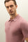 Rosafarbenes Kurzarm-Poloshirt aus Baumwolle mit Wabenstruktur