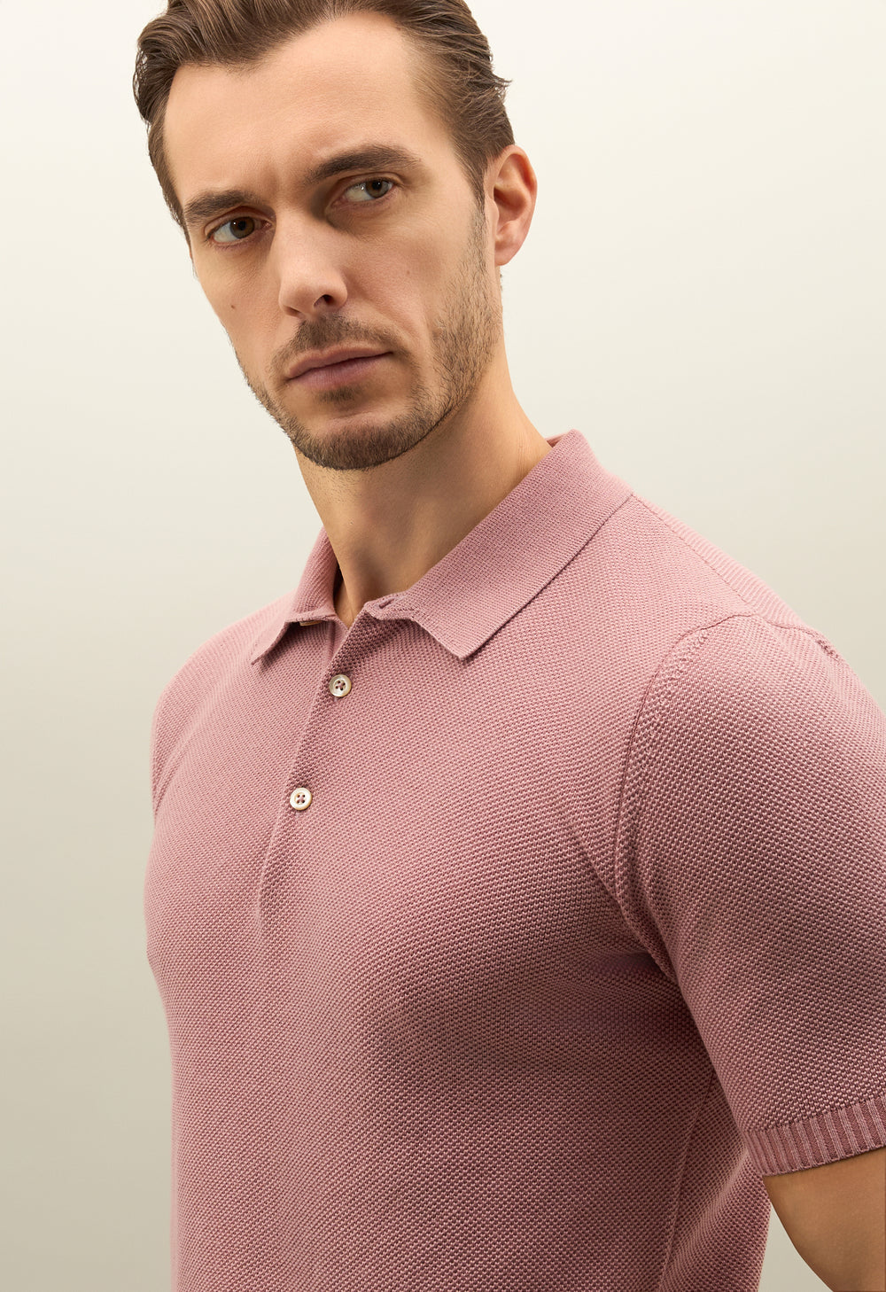Rosafarbenes Kurzarm-Poloshirt aus Baumwolle mit Wabenstruktur