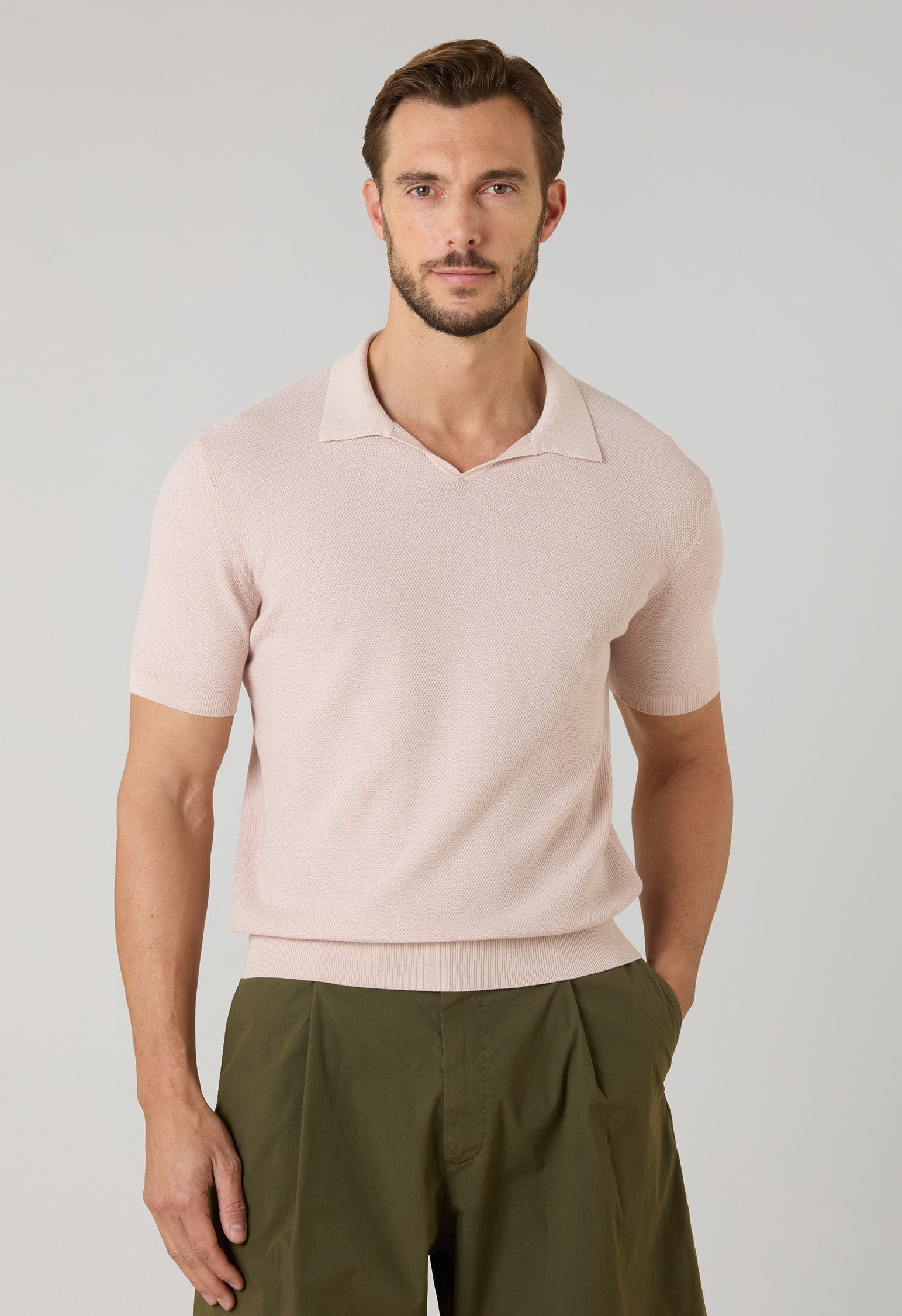 Pastellrosafarbenes stückgefärbtes Kurzarm-Poloshirt aus Baumwoll-Pikee